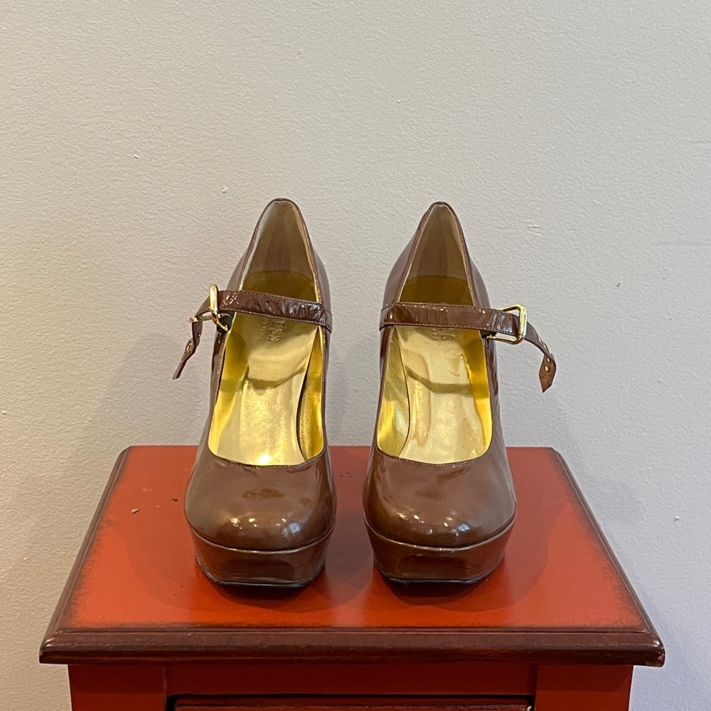 Guess by Marciano brown heels. Front cross strap with gold clasp.